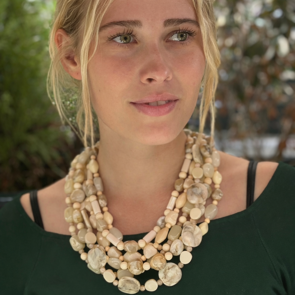 Otilia Multi Strand Shades Of Ivory Resin Beads