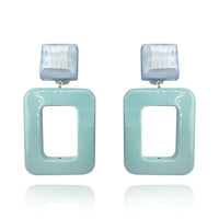 Clip On Earrings With Mirrored Square Resin Tops And Light Turquoise Drops