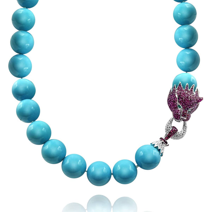 Collier noué turquoise 18 mm - 16" avec fermoir lion en argent sterling et rubis CZ