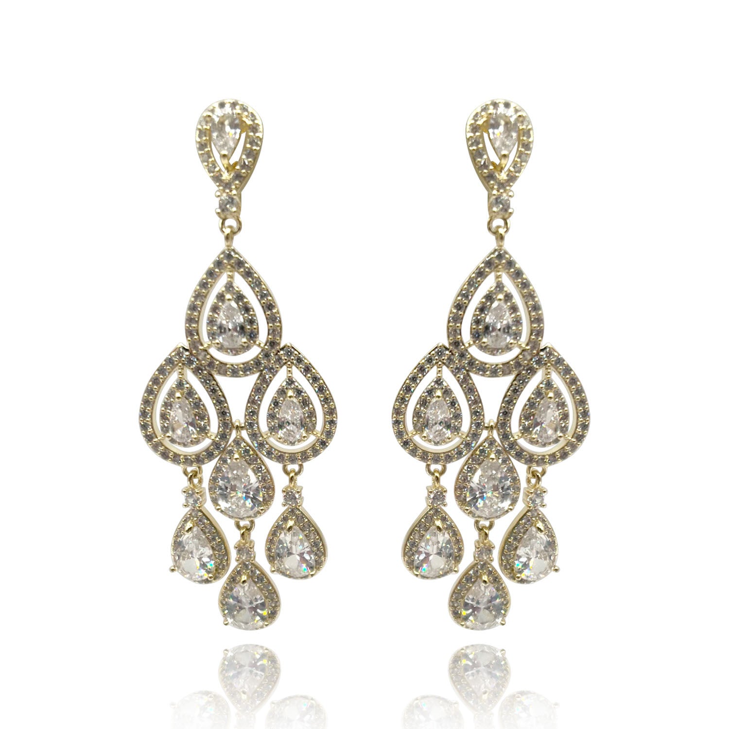 Pendientes de clip Delicia con cristales en forma de pera y baño de oro